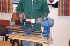 Ian has the piece set up for decorating using an ornamental lathe